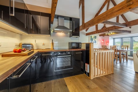 Copperhouse View, St Ives. First floor: Open-plan kitchen leading to sitting room