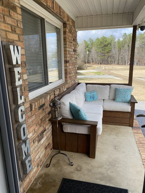 Comfy Bench seating overlooking the lake, great for relaxing with a good book