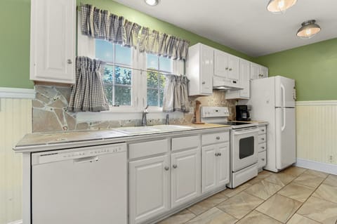 Truly unique with a Custom Back Splash created with Stone & Sea Glass.