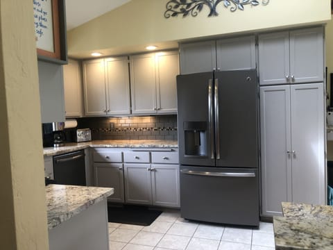 Kitchen with refrigerator
