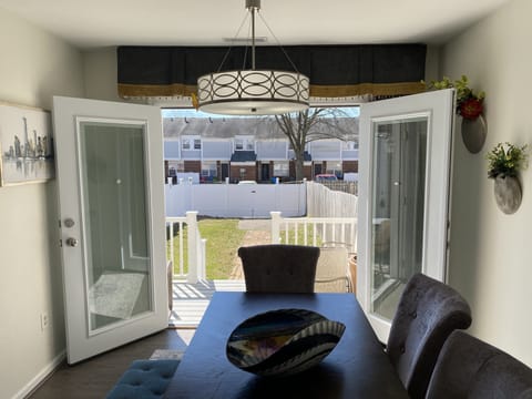 The dining room area opens to the back porch and large back yard.