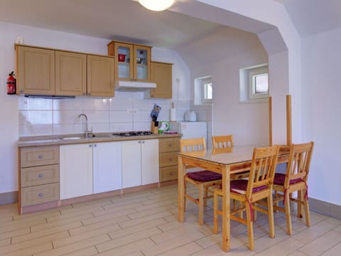 Flooring, Floor, Wood, Interior Design, Furniture, Ceiling, Kitchen, Room, Countertop, Lighting