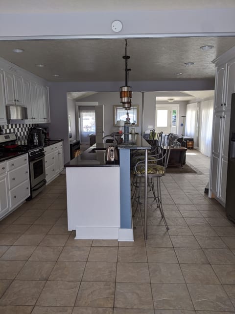 View of kitchen and living room from 3rd sleeping area
