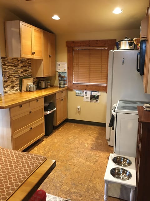 Kitchen has all you could need. Feeding station for pets.