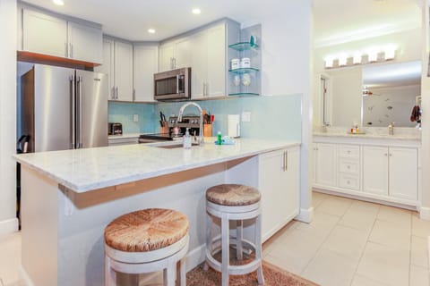 Walls have been removed to give the condo a more open feel.