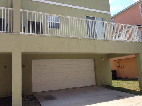 Shaded partial carport for two cars