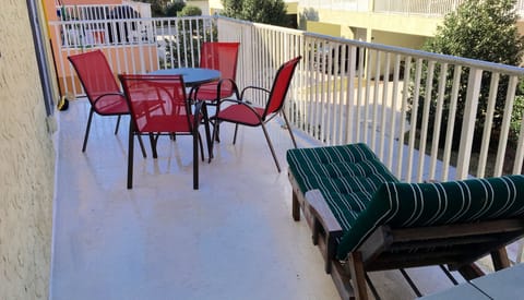 Sunbathe or dine by the kitchen