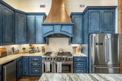 48" gas range by Thor Kitchen. Matching ice machine and refrigerator.
