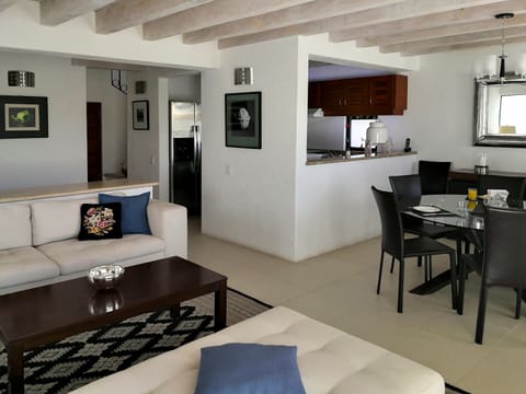 Living room, dining room and kitchen