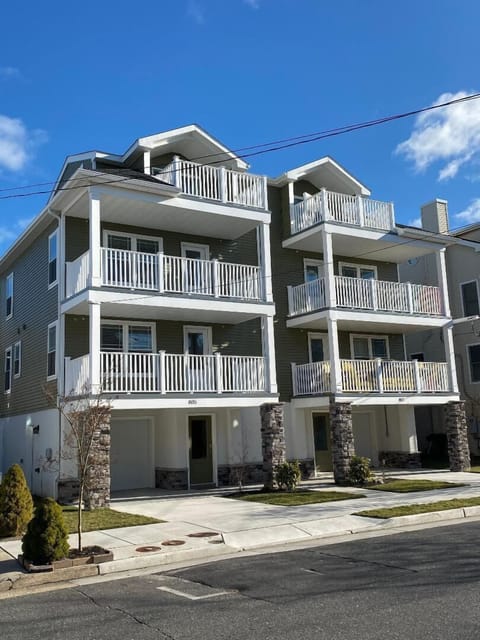 Three floors of living space with large garage, elevator and 3 private decks. 
