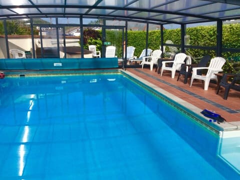 Our heated pool has a telescopic enclosure, swim and relax whatever the weather