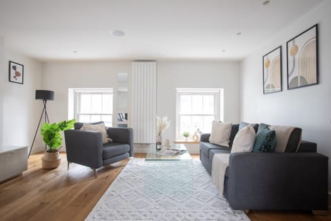 There is a flat screen TV with local channels and free Wi-FI