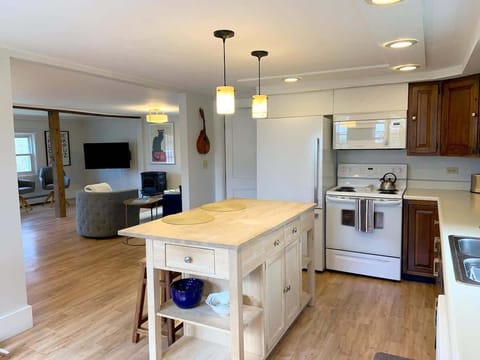 Kitchen opens into living and dining room space. Great for entertaining and groups!