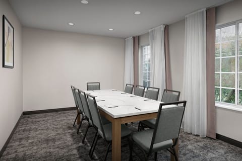 Gather in a stylish meeting space, perfect for productive discussions.