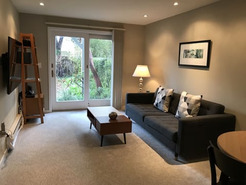 Stylish, comfortable living area with direct access to your private garden
