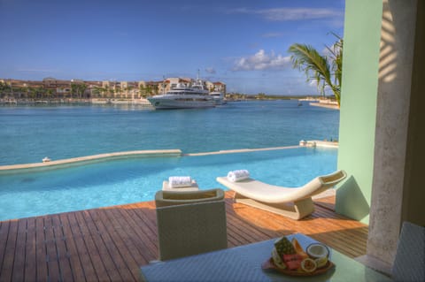Private wooden deck with access to pool