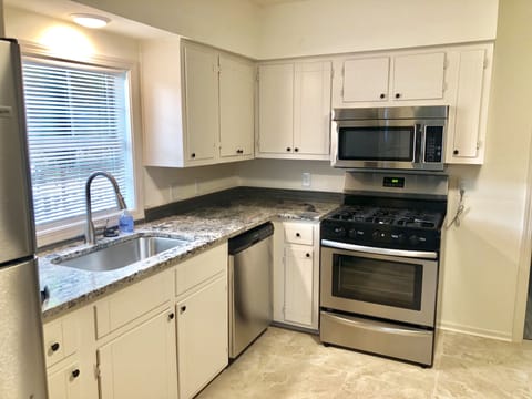 Fully remodeled kitchen w/ granite counters & stainless appliances