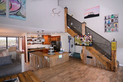 Kitchen, stairs to bedrooms