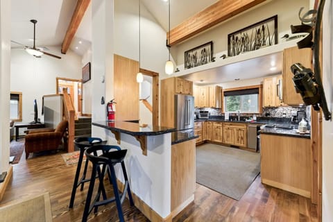 Our spacious kitchen features a gas range, dishwasher, and is fully equipped for all your culinary needs.