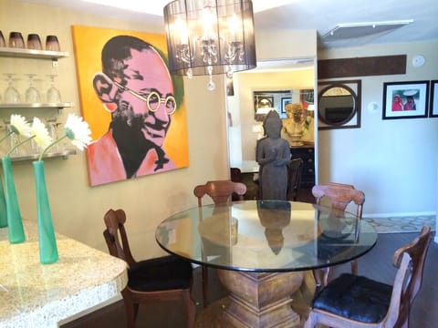 Large dining table adjacent to kitchen.  