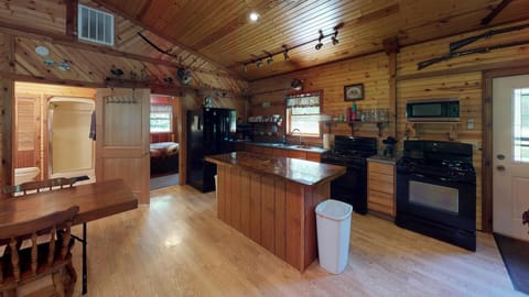 Full kitchen has 2 stoves (both with ovens), large refrigerator, bunn coffee pot