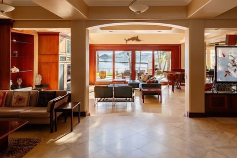 The open layout and stylish architecture make this luxurious home feel even larger than it already is.