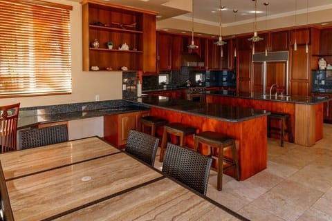 This gorgeous, well-stocked kitchen makes whipping up a meal easy and convenient.