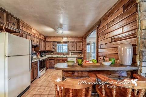 another view of kitchen and bar