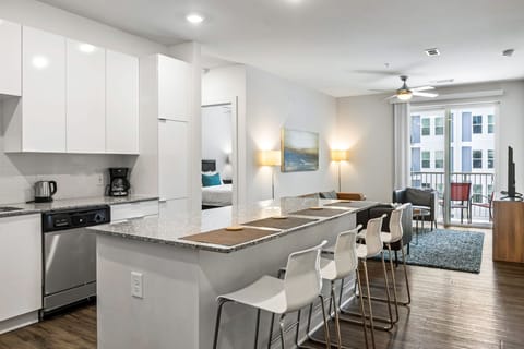 Modern Kitchen with Whirlpool Stainless Steel Appliances - Corporate Housing Atlanta - 2-Bedroom Spectacular Suites
