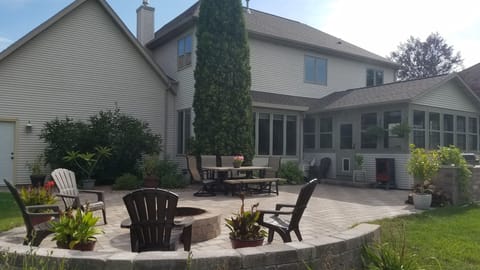 Patio. features a 3 burner gas Webber grill, and chest smoker.