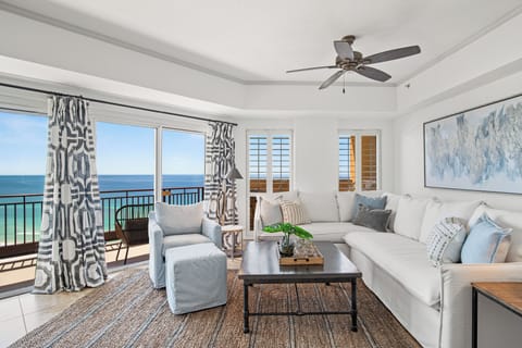 Gulf-front living room designed for the whole family to relax and enjoy stunning views together.