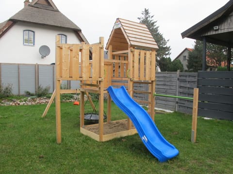 Sky, Property, Plant, Tree, Building, Land Lot, Slope, Shade, Asphalt, Wood