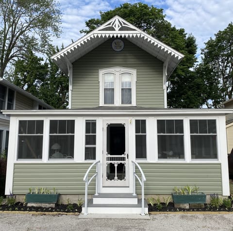 Parking for 2 cars in front of large wrap around porch.