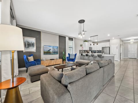 A cozy and elegant living space for comfort and connection – the perfect place to enjoy your favorite entertainment together.