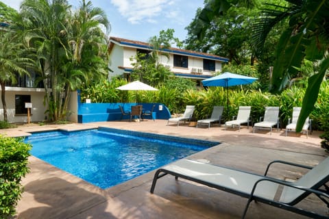 View of the pool and property.  9 apartments available for short and mid term.