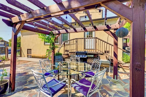 Back dining area with propane bbq.