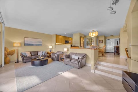 Stay connected in a spacious living room that flows into the dining area for easy gatherings