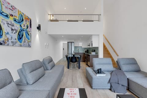 Living room: Features 4 full sofa beds and a Smart HD TV with access to Netflix, Disney+, and Prime.