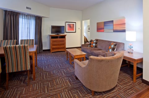 Snuggle up with a cup of coffee or tea on the comfortable sofa.