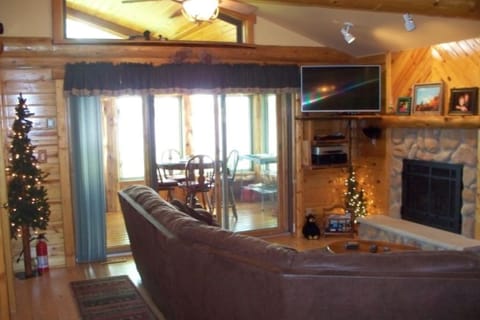 Family Room with gas fireplace & HD TV and satellite cable with Stereo Receiver