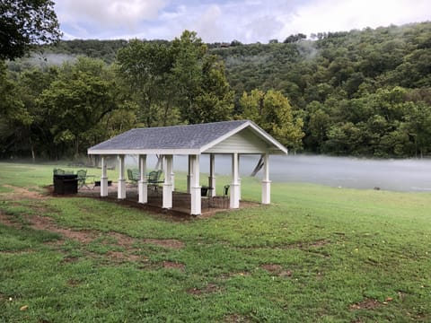 Pavilions By the Water’s Edge have Seating, a Grill,  a Fire Pit & Fire Wood