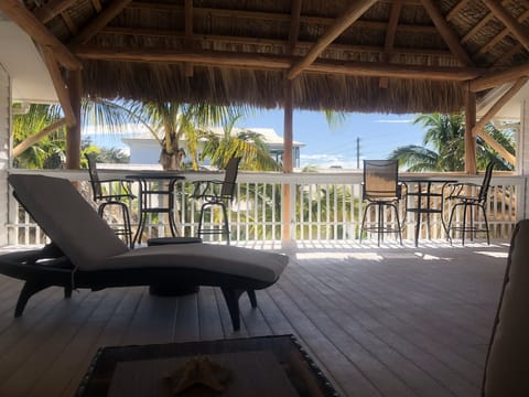 Relax under the Tiki Hut. Enjoy dinner or a breakfast. Life is just better.