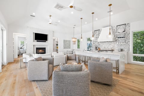 4 Comfortable Chairs in Open Concept Living Room Area