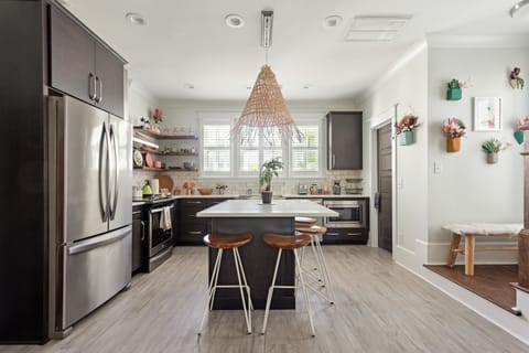 Fully Stocked Kitchen with Island Seating for 4