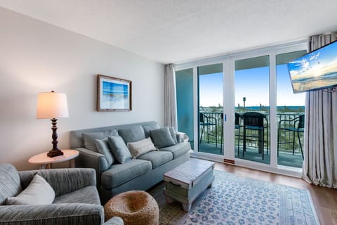 Cozy Living Area with Queen Size Sleeper Sofa and Access to Private Balcony facing the Gulf