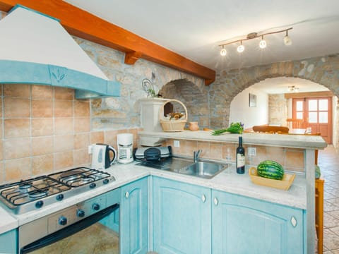 Countertop, Cabinetry, Property, Kitchen, Azure, Sink, Interior Design, Kitchen Appliance, Kitchen Stove, Floor