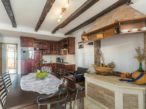 Table, Furniture, Property, Picture Frame, Cabinetry, Chair, Couch, Wood, Countertop, Interior Design