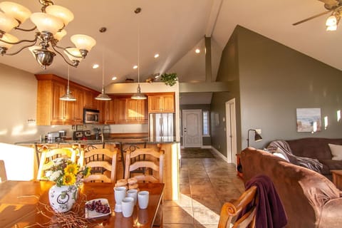 The open floor plan and high ceilings let in plenty of natural light.