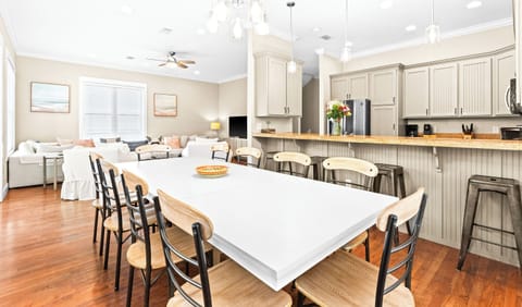 Gather around this dining table where meals become memories