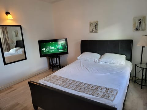 Unwind in comfort: Your cozy retreat awaits, complete with a 50" smart TV.